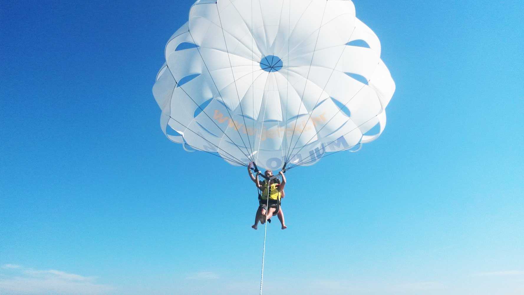 Parasailing - Water sports - Parachute rides on water